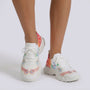 Essyro women's white flying-woven sneakers featuring a colorful floral pattern and comfortable white rubber soles.