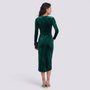 Essyro emerald green velvet midi dress with long sleeves and back view on a model wearing nude high heels