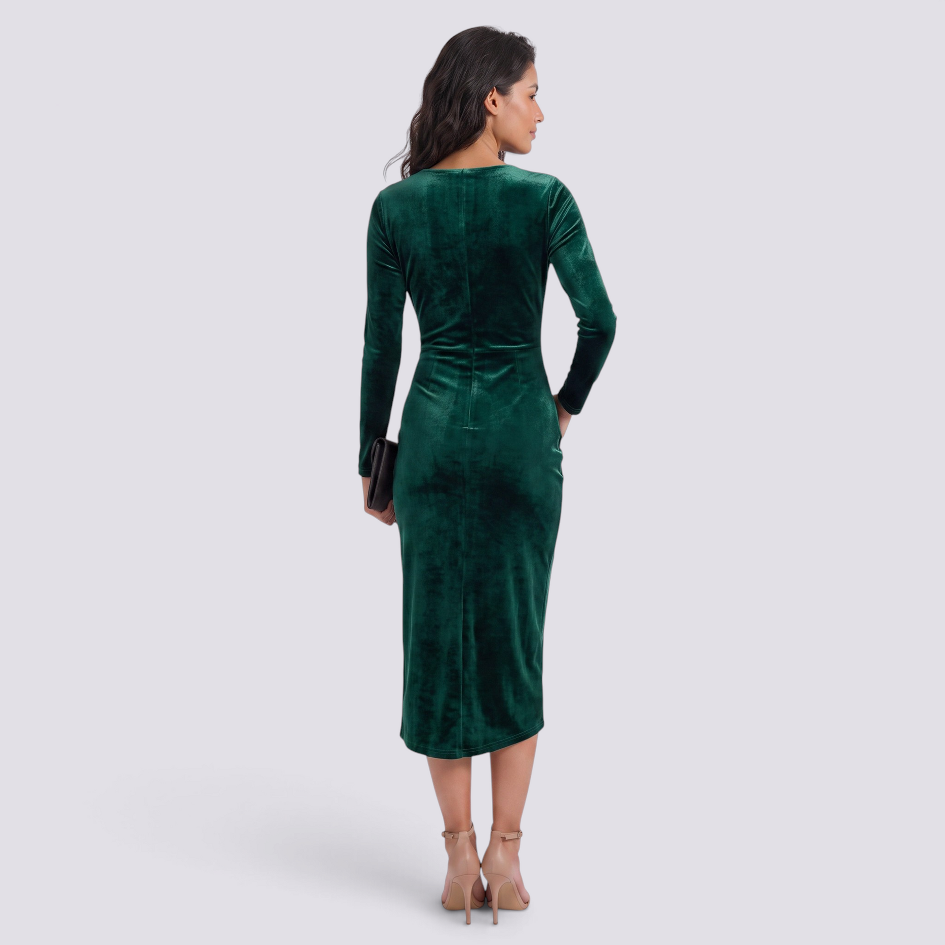 Essyro emerald green velvet midi dress with long sleeves and back view on a model wearing nude high heels