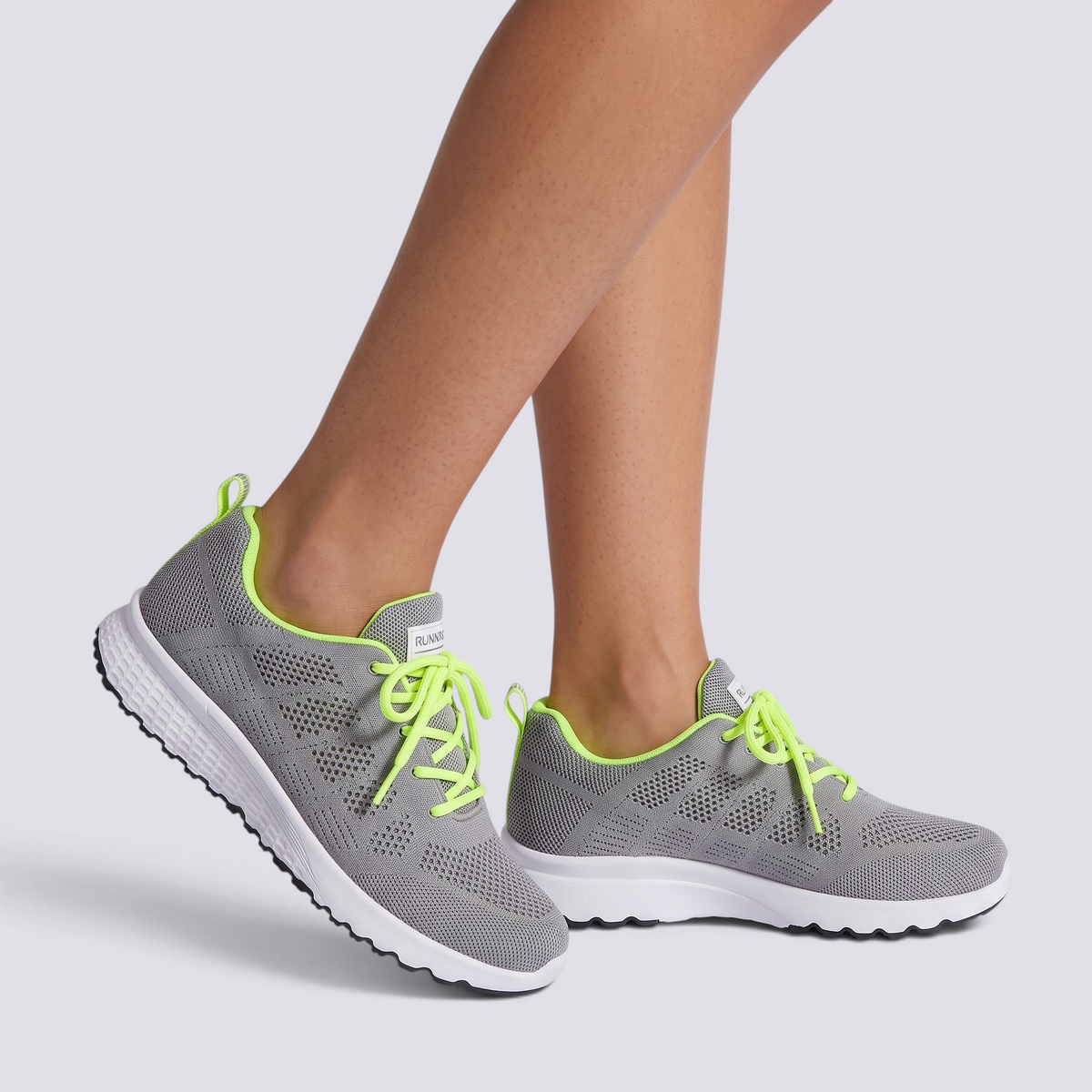Essyro women's lightweight grey sneakers with neon yellow laces and breathable mesh fabric for daily comfort