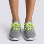 Essyro women's lightweight grey sneakers with breathable knit fabric, neon yellow laces, and a flexible white sole.