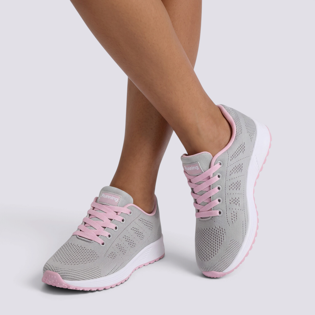 Essyro women's lightweight grey sneakers with pink laces and breathable technical fabric for daily comfort
