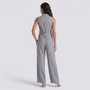 Back view of a woman wearing an Essyro grey tailored vest and matching wide-leg trousers for a sophisticated look.