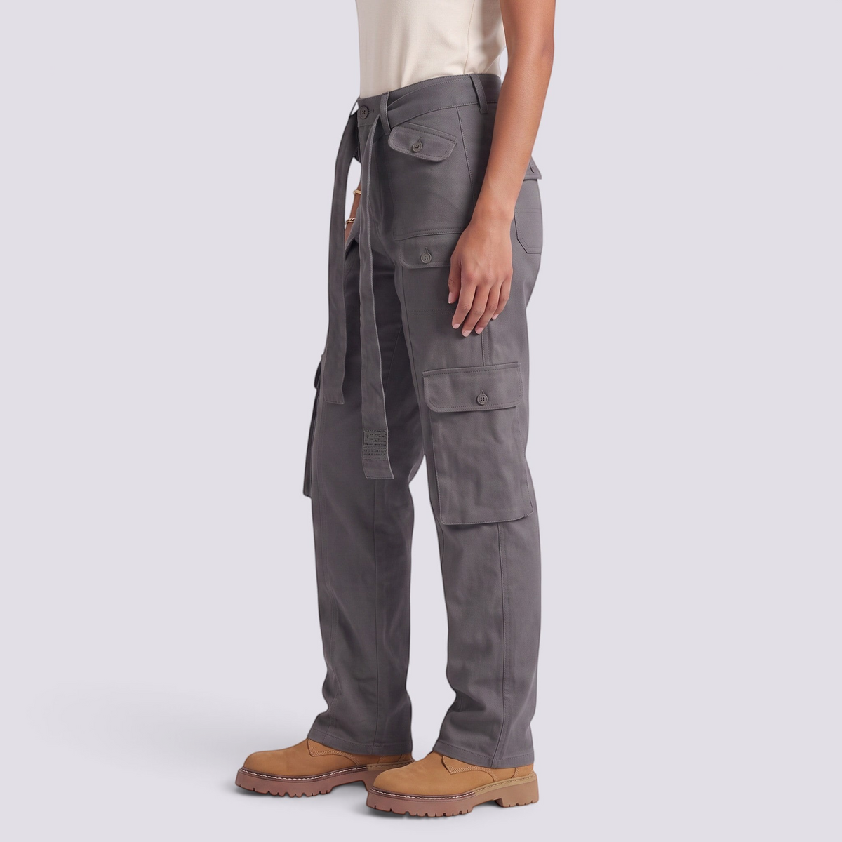 Essyro women's grey cargo jeans with a washed effect, straight leg, and functional utility pockets, side view.