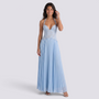 Essyro light blue halter neck maxi dress with a corset bodice and pleated skirt worn by a smiling model