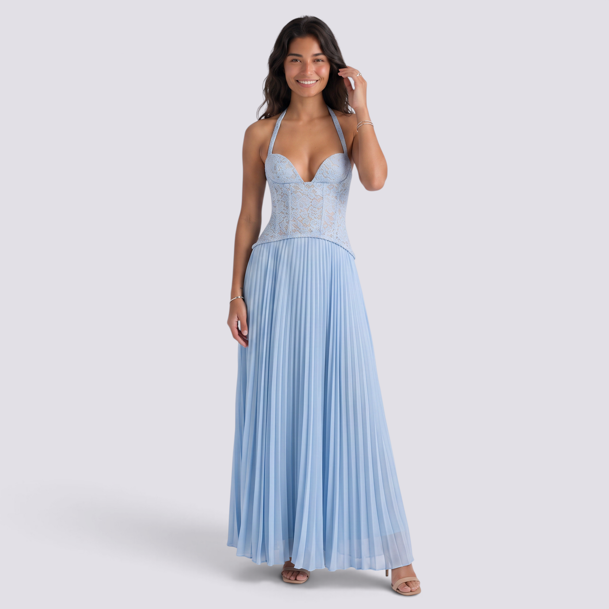 Essyro light blue halter neck maxi dress with a corset bodice and pleated skirt worn by a smiling model