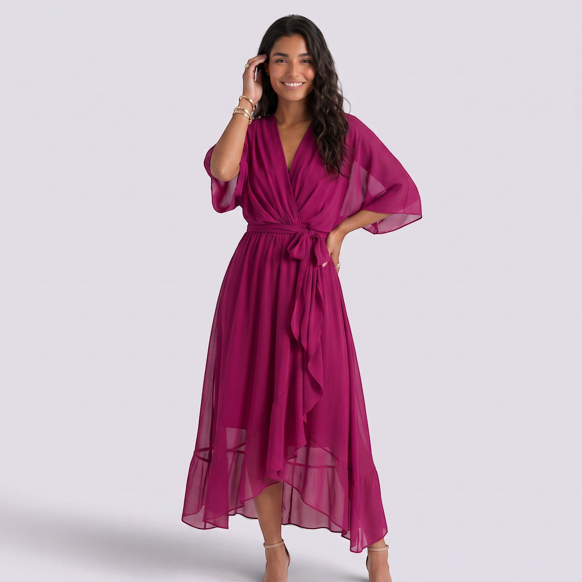 Essyro magenta maxi dress with V-neck, batwing sleeves, and a tie-waist, worn by a smiling model.
