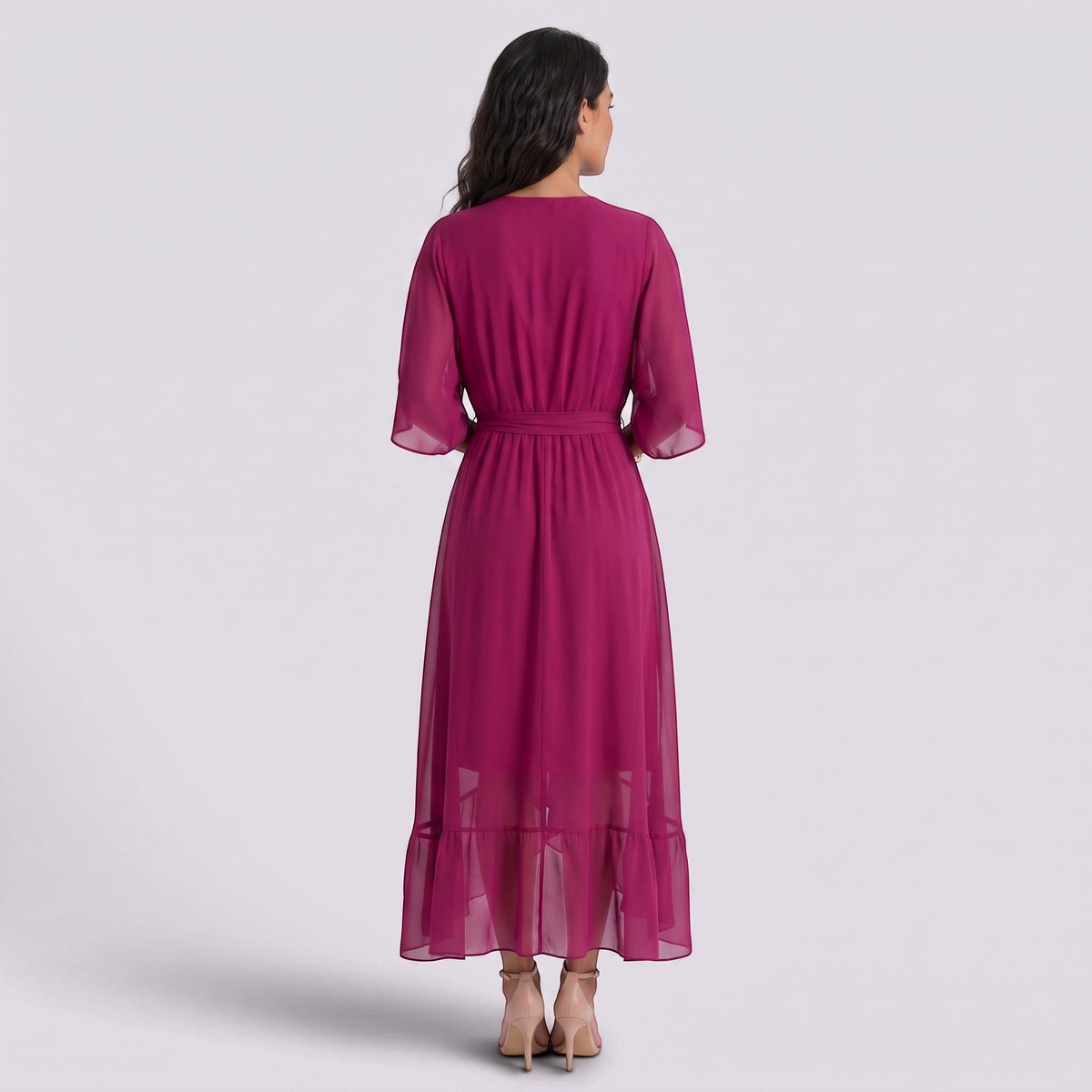 Essyro magenta maxi dress with batwing sleeves, cinched waist, and asymmetrical hem viewed from the back