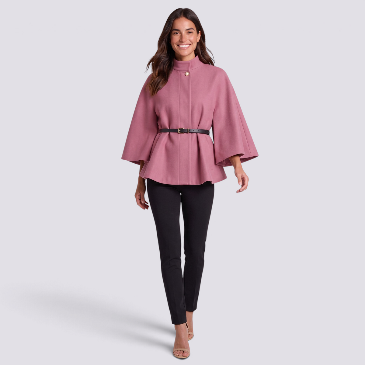 Essyro mauve batwing sleeve cape with mandarin collar, gold button, and thin black belt worn by a smiling model