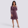 Essyro mauve velvet short dress with long sleeves and a draped cowl neckline worn by a woman with nude heels