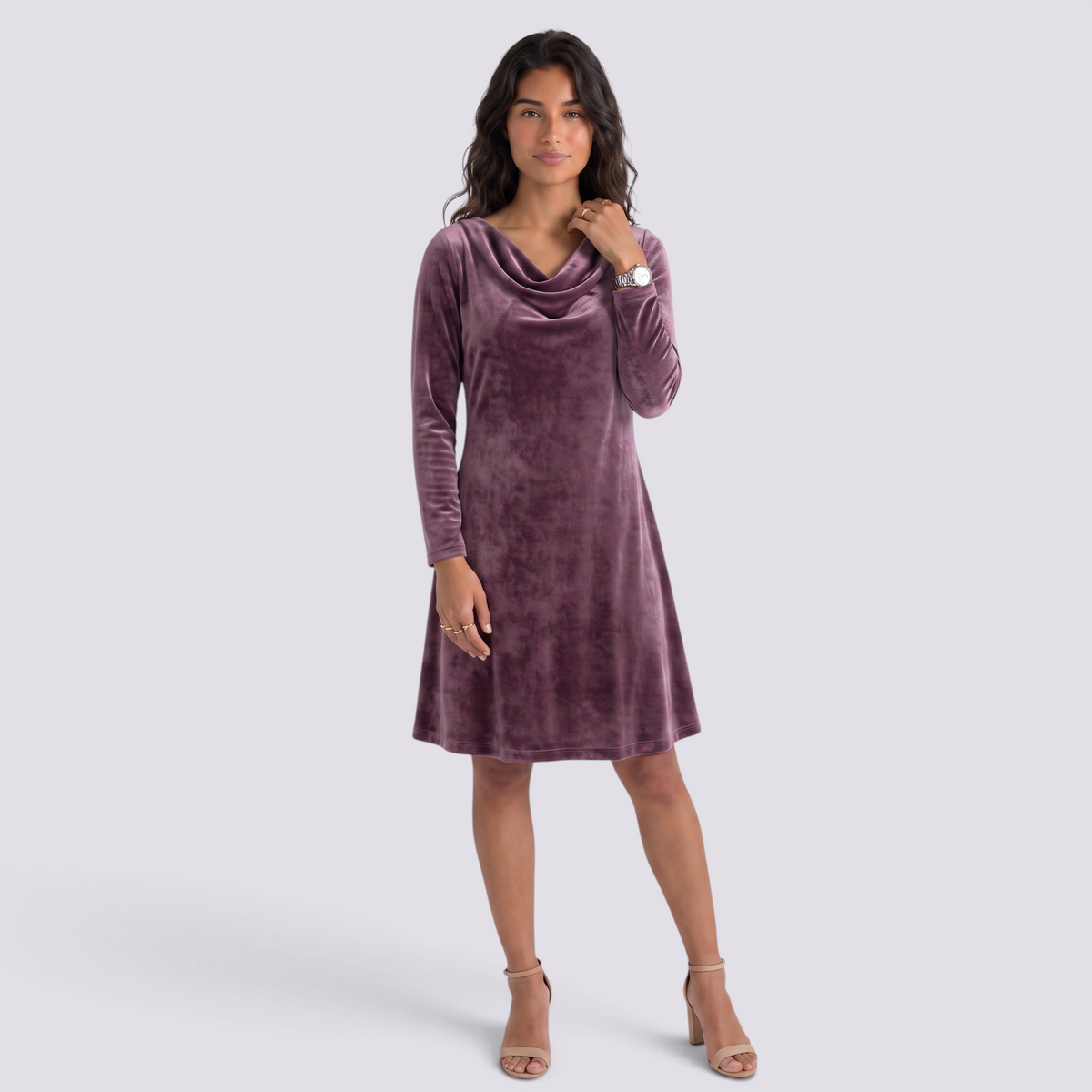 Essyro mauve velvet short dress with long sleeves and a draped cowl neckline worn by a woman with nude heels