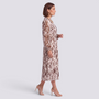 Essyro midi dress with long sleeves, high neck, and brown abstract print, featuring a pleated skirt and waist tie.