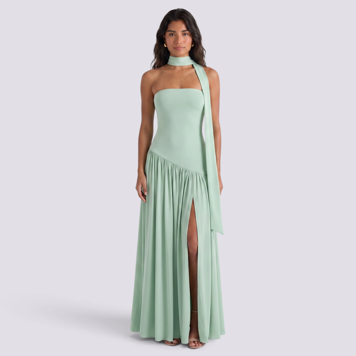 Essyro mint green floor-length evening dress with halter neck, strapless bodice, and draped asymmetric side slit skirt