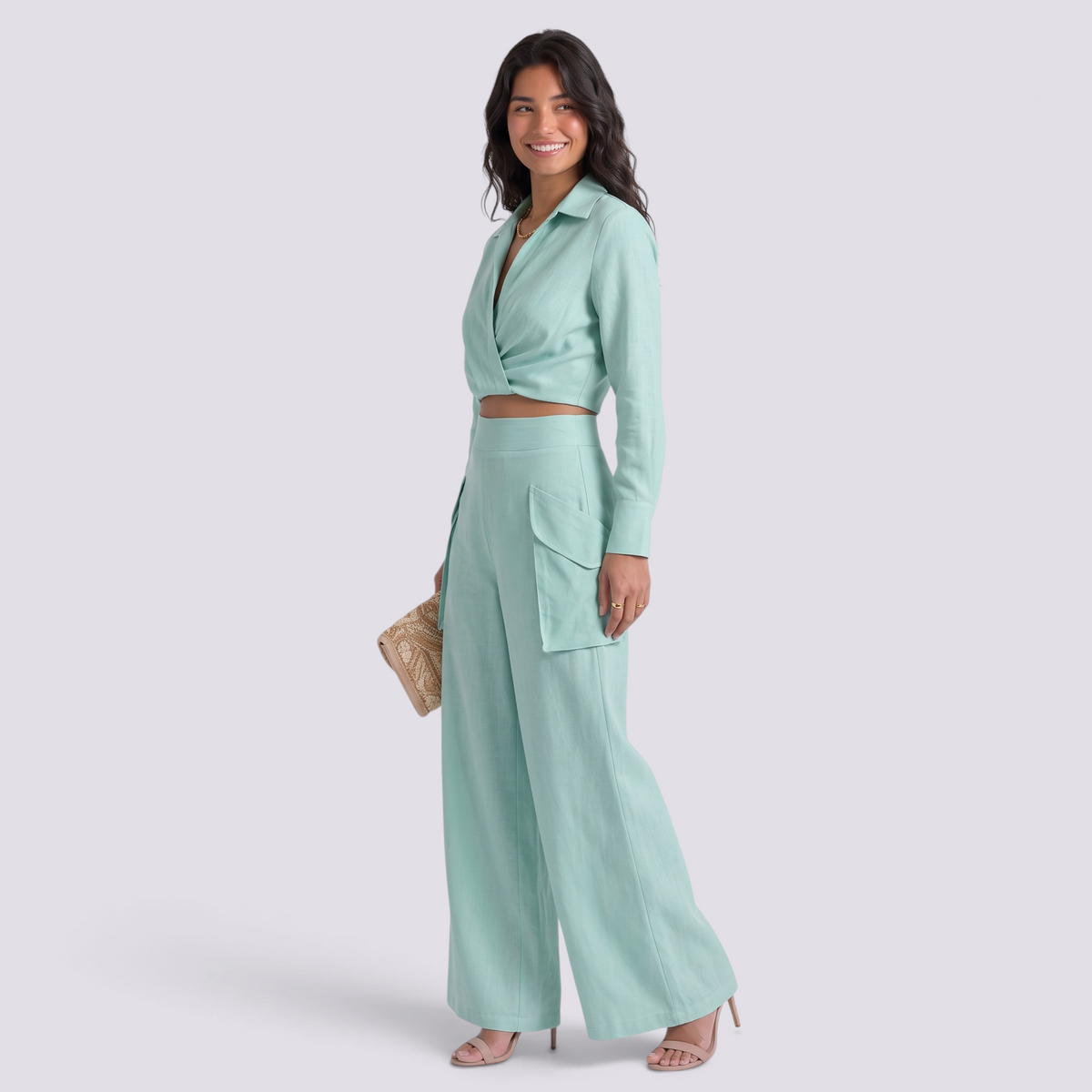 Essyro mint green two-piece set featuring a long-sleeve wrap top with lapel collar and high-waisted palazzo pants.