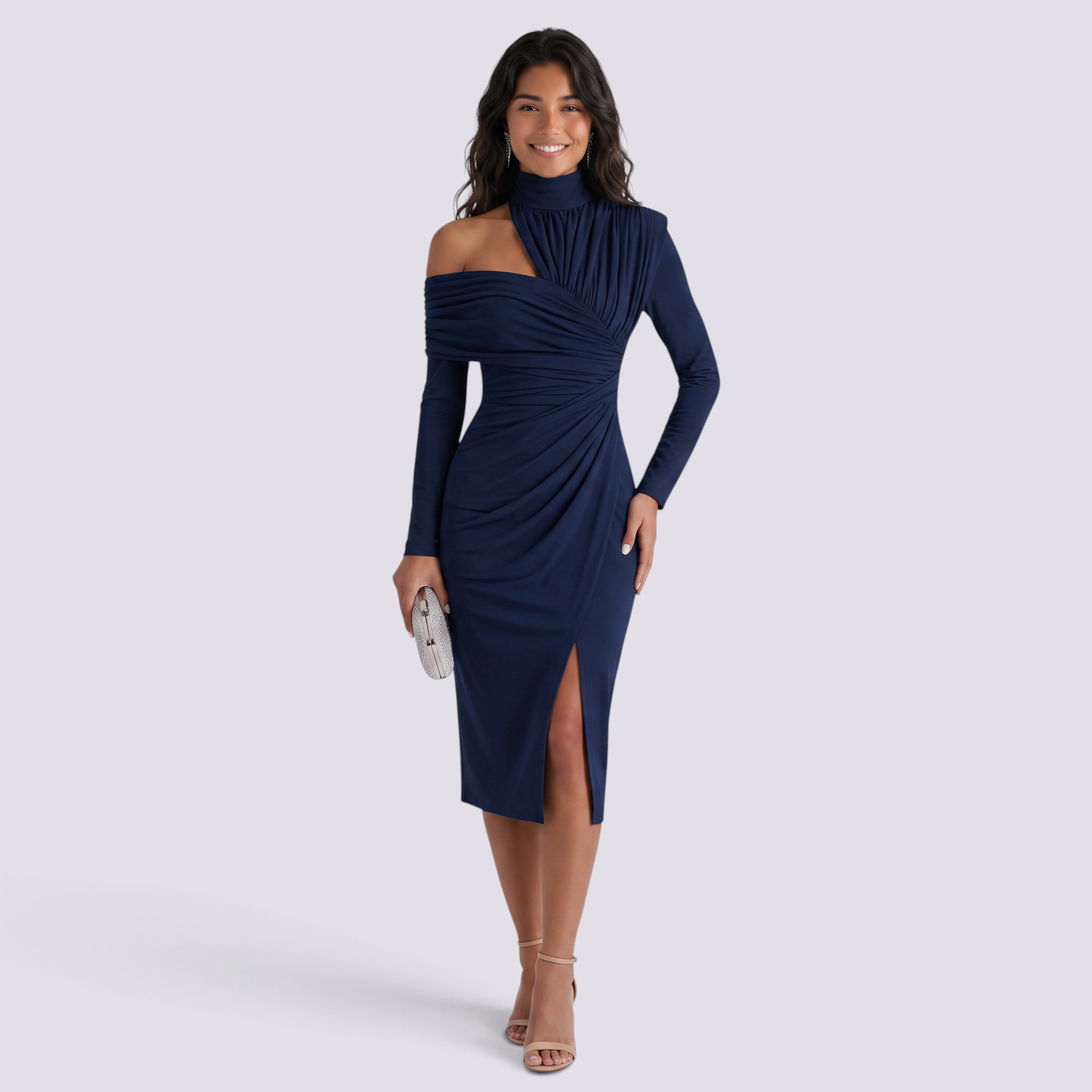 Essyro navy blue midi dress with asymmetrical neckline, long sleeves, waist ruching, and a side slit on a model.