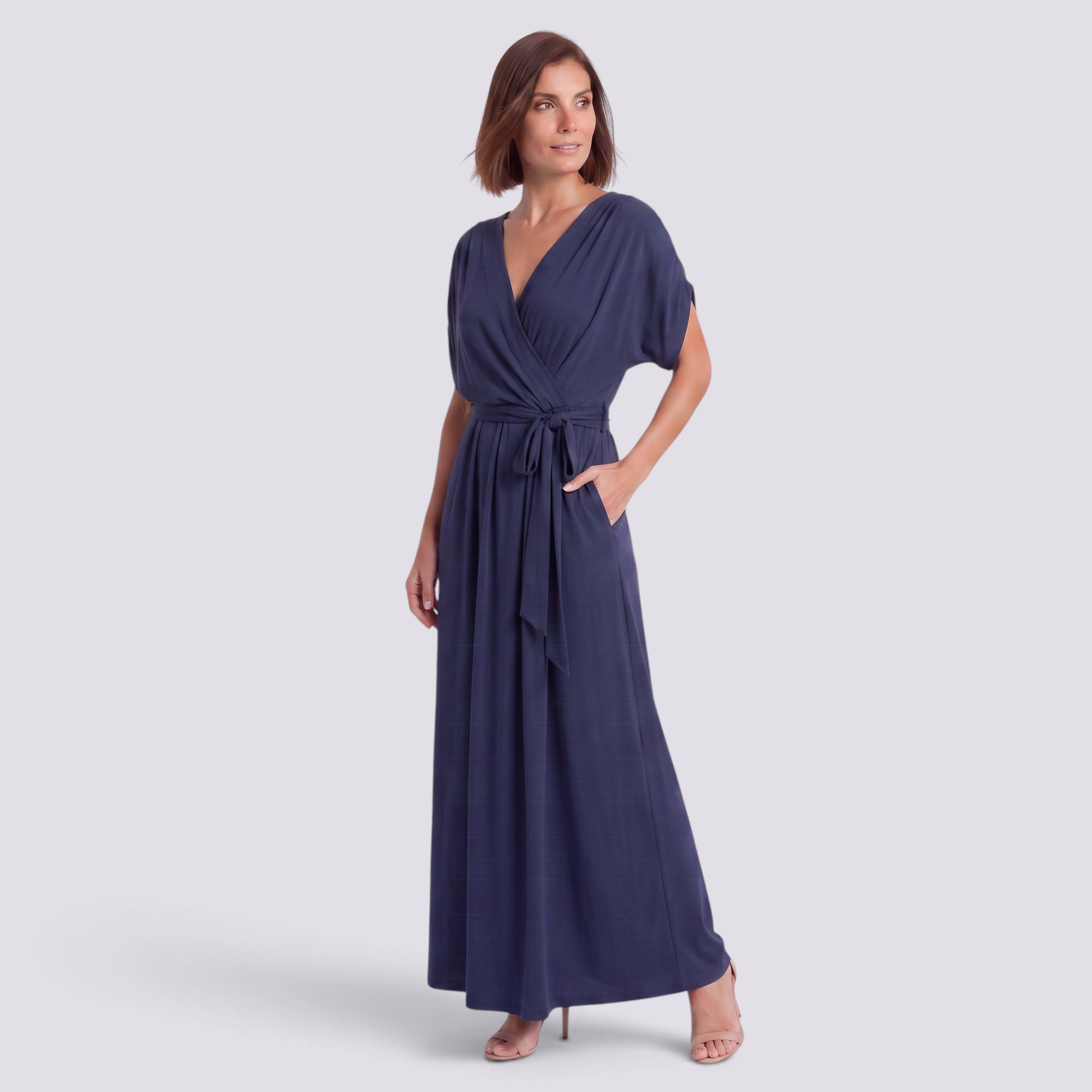 Essyro navy blue plus size maxi dress with a wrap-style bodice, tie waist, and fluid floor-length skirt.