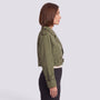 Essyro women's olive green cropped windbreaker jacket with epaulettes and belted cuffs worn by a model side view