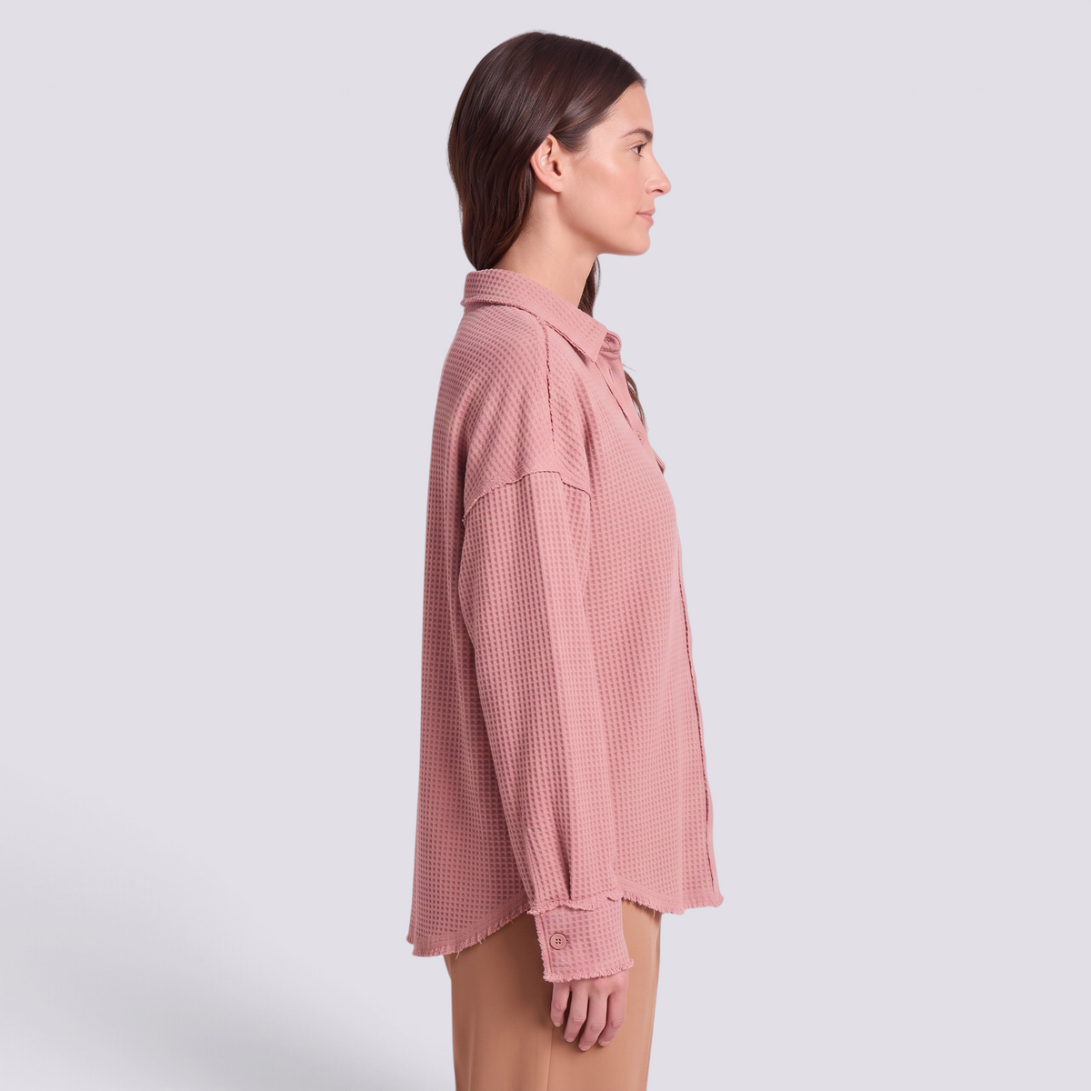 Essyro long-sleeve dusty pink waffle-knit shirt jacket with a collar and button-up front, side view on a model.