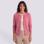 Essyro pink wool cardigan with a round neck and button-down front worn by a smiling woman on a neutral background.