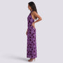 Essyro purple floral maxi dress with halter neckline and open back worn by a model in a side profile view.