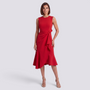 Essyro red sleeveless midi dress with a round neck and decorative waist bow, worn by a woman on a grey background.