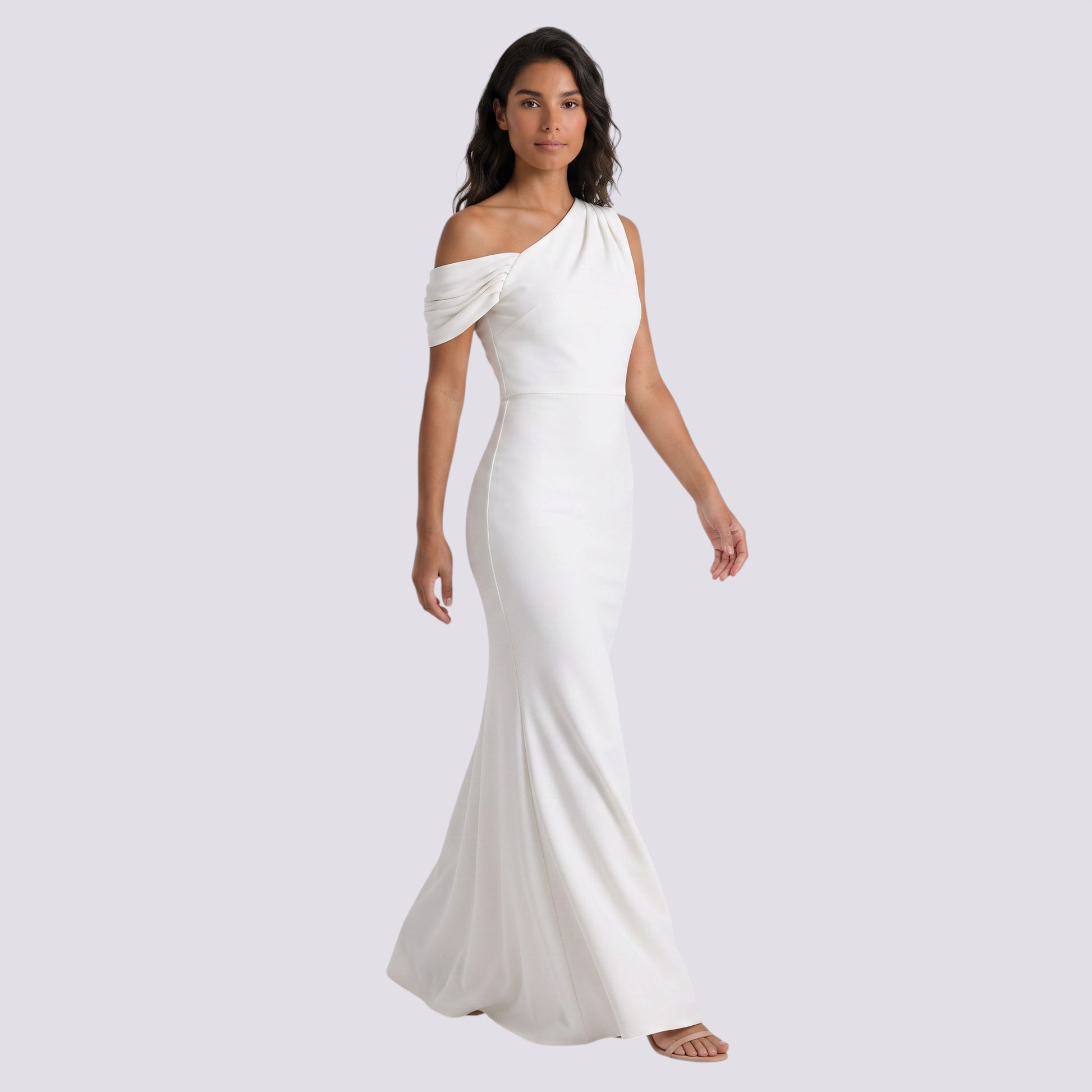 Essyro white floor-length mermaid gown with an asymmetrical one-shoulder draped sleeve on a model