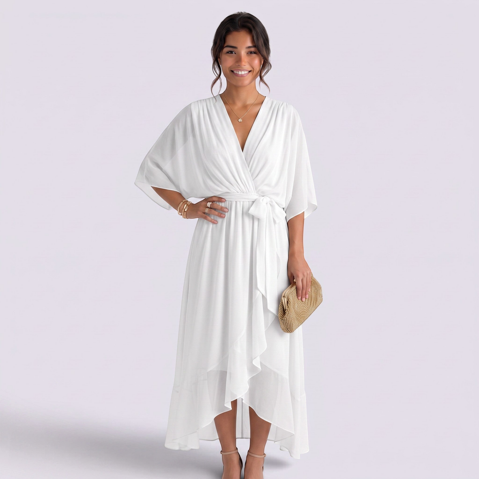 Essyro white maxi dress with V-neck, batwing sleeves, and a tie-waist, worn by a smiling woman in a studio.