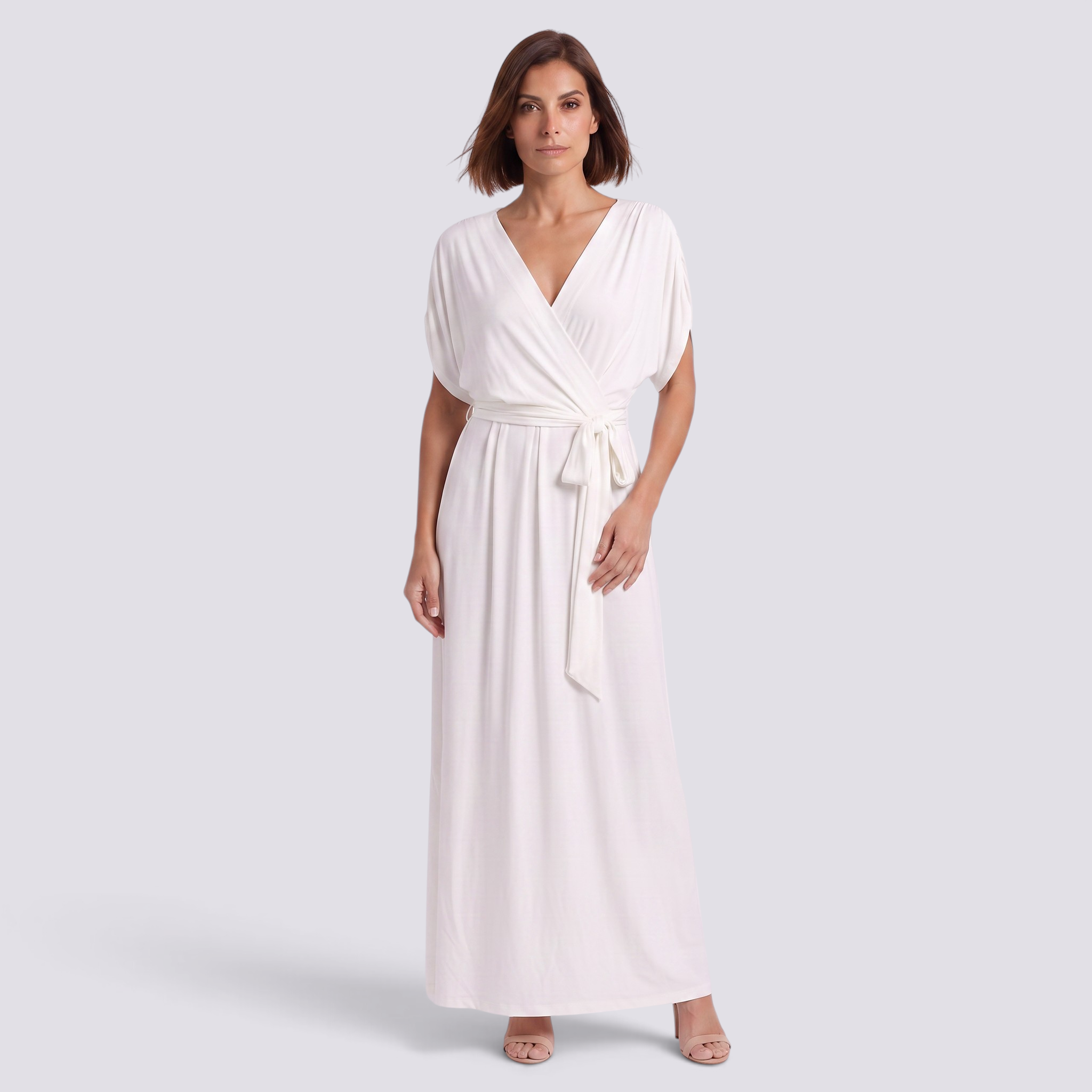 Essyro elegant white plus size maxi dress with a wrap-style bodice, short sleeves, and a soft flowing floor-length hem