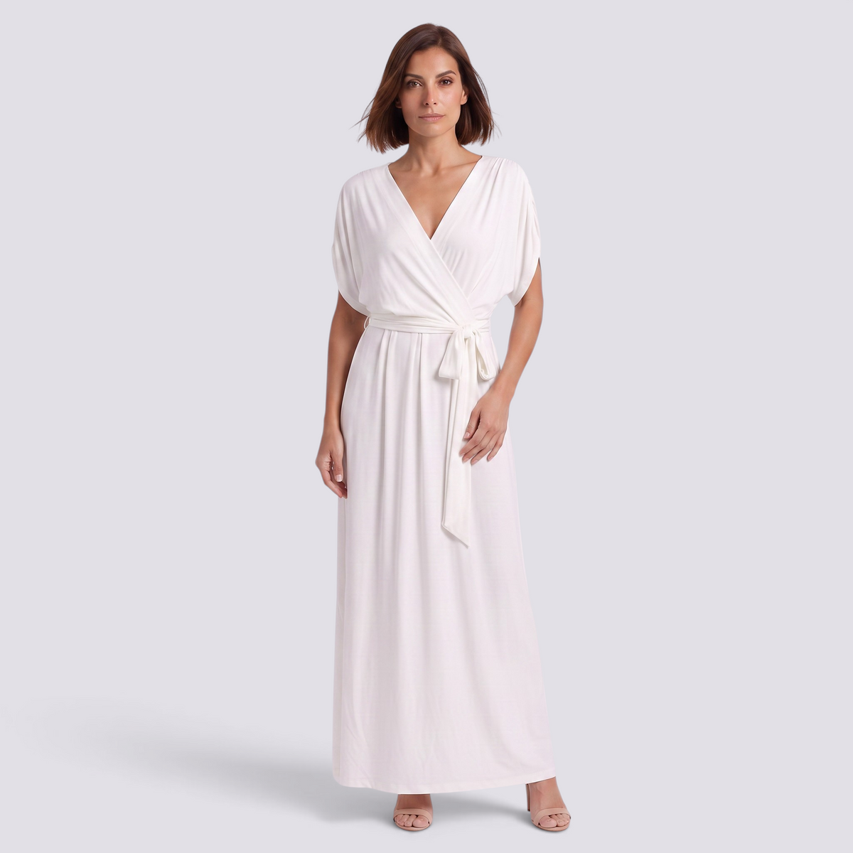 Essyro elegant white plus size maxi dress with a wrap-style bodice, short sleeves, and a soft flowing floor-length hem