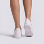 Essyro white platform sneakers for women with a chunky lug sole, viewed from the back on a clean studio background.