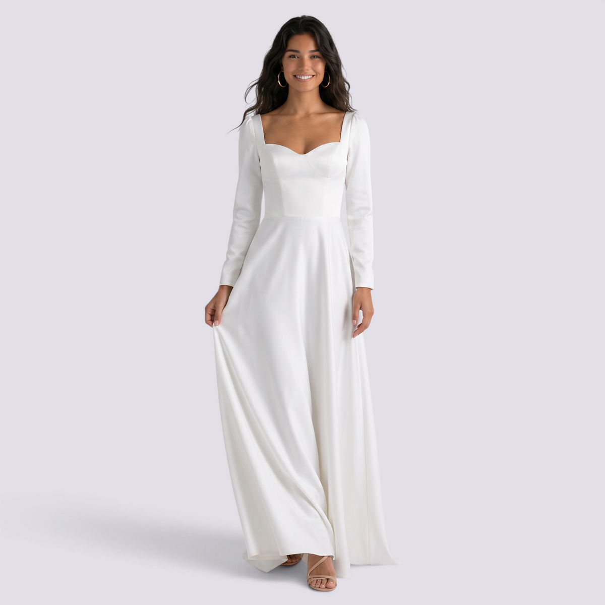 Essyro white A-line wedding dress with square neckline and long sleeves worn by a smiling model