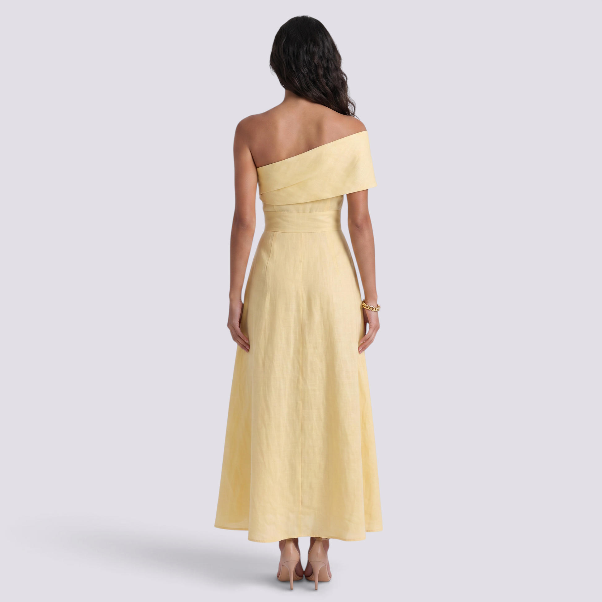 Essyro elegant yellow off-the-shoulder maxi dress with a fluid silhouette worn by a model from the back view