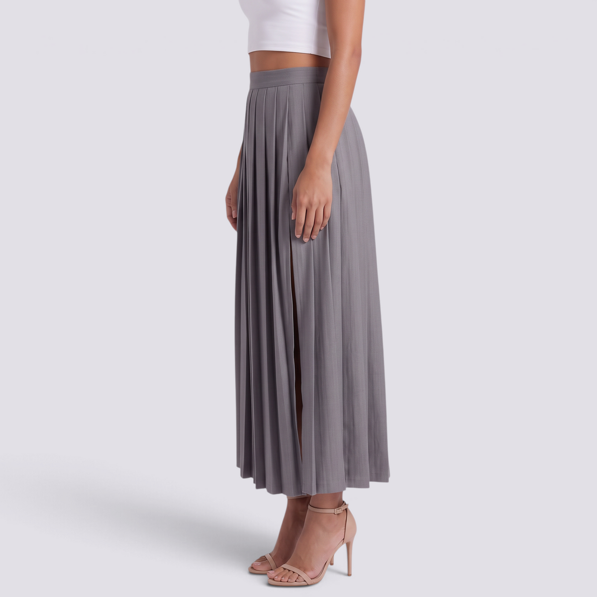 Falda larga plisada de mujer con cintura alta, pliegues tableados y abertura frontal en gris, vista lateral