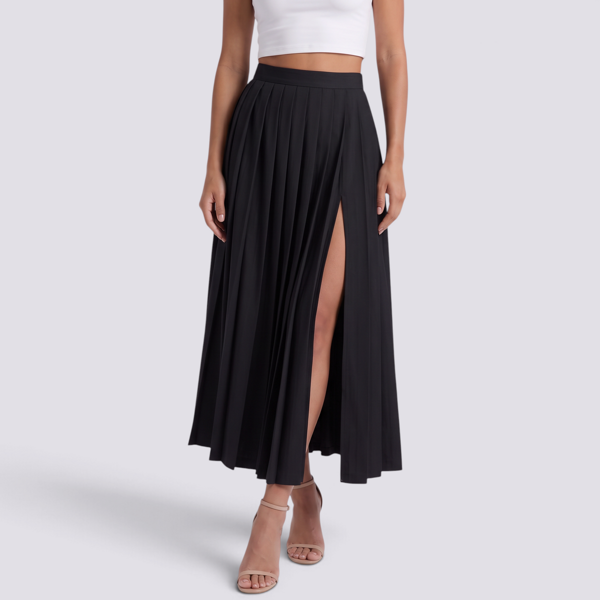 Falda larga plisada de mujer con cintura alta, pliegues tableados y abertura frontal en negro, vista frontal