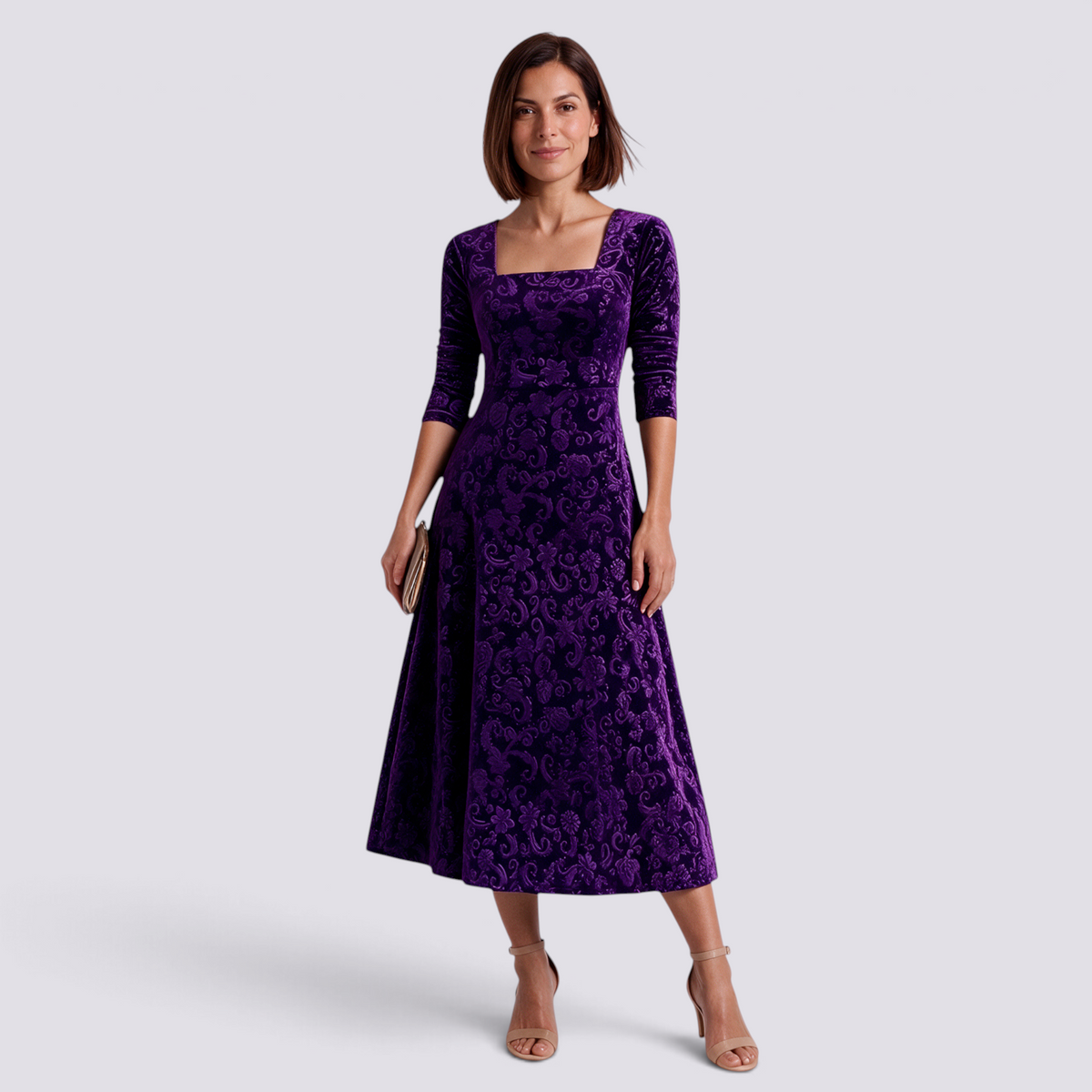 Essyro purple velvet midi dress with floral jacquard pattern, square neckline, and A-line skirt worn by a model.
