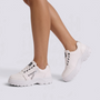 Zapatillas deportivas de mujer con plataforma y cremallera en blanco, vista lateral