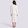 Conjunto mujer cárdigan y falda midi con botones dorados en color Blanco, vista trasera