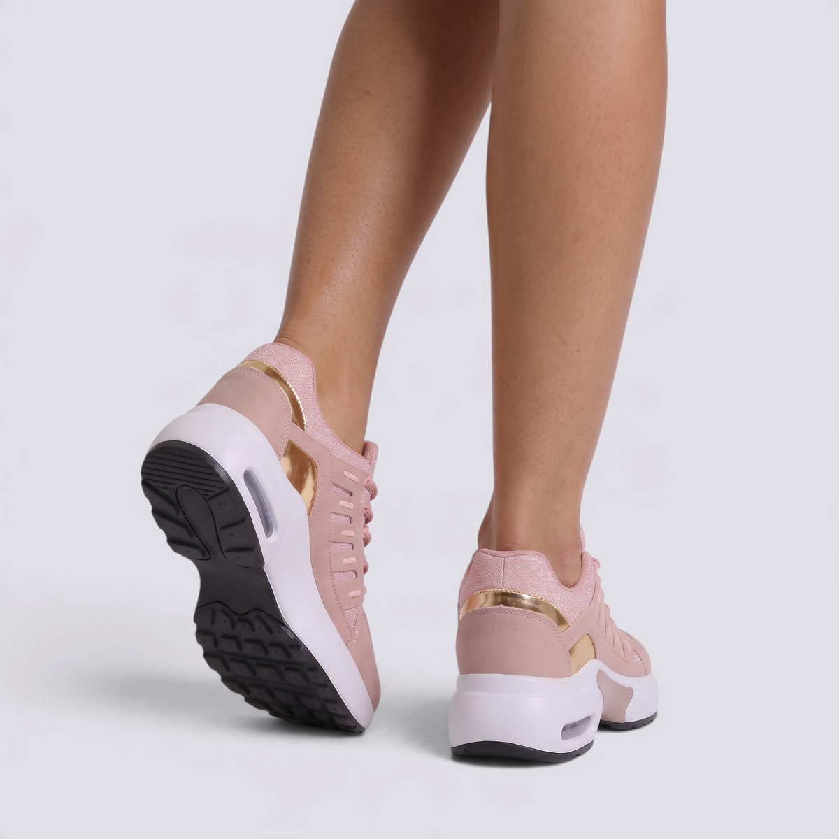 Zapatillas deportivas chunky mujer rosas con suela de plataforma y paneles calados, vista trasera