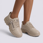 Zapatillas deportivas de mujer con plataforma y cremallera en crema, vista frontal