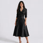 Vestido entallado manga larga color negro, vista frontal