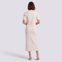 Conjunto punto mujer polo y falda con botones, blanco crema, vista trasera