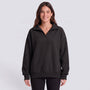 Sudadera mujer oversize con media cremallera y cuello solapa en color negro, vista frontal
