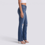 Vaqueros rotos de mujer con campana y efecto desgastado en azul oscuro, vista lateral