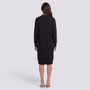 Vestido jersey de mujer con cuello polo y botones en negro, vista trasera