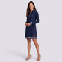 Vestido polo de mujer con media cremallera y bolsillos color azul marino, manga larga y cuello polo, vista frontal