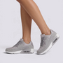 Zapatillas deportivas mujer con cámara de aire en gris, vista lateral