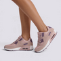 Zapatillas deportivas mujer con cámara de aire en rosa y púrpura, vista lateral