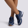 Zapatillas deportivas mujer con detalle metalizado azul marino vista frontal