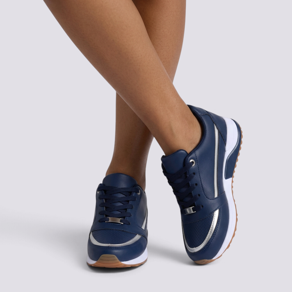 Zapatillas deportivas mujer con detalle metalizado azul marino vista frontal