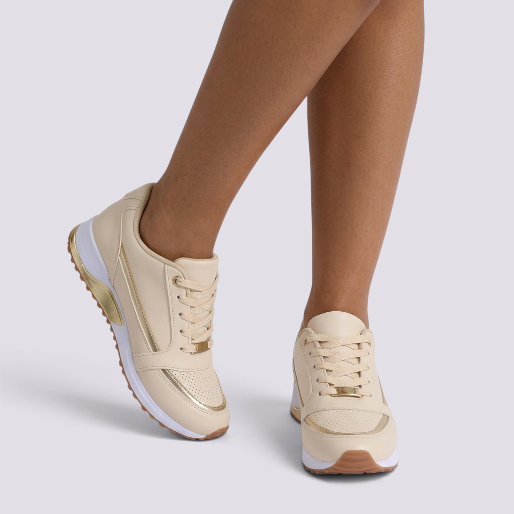 Zapatillas deportivas mujer con detalle metalizado beige vista frontal
